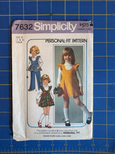 Load image into Gallery viewer, Simplicity 7632 personal fit sewing pattern envelope for children, featuring illustrations of three girls in different outfits, placed on a blue grid cutting mat.
