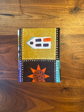 Load image into Gallery viewer, Small fabric pouch with geometric design on a wooden surface
